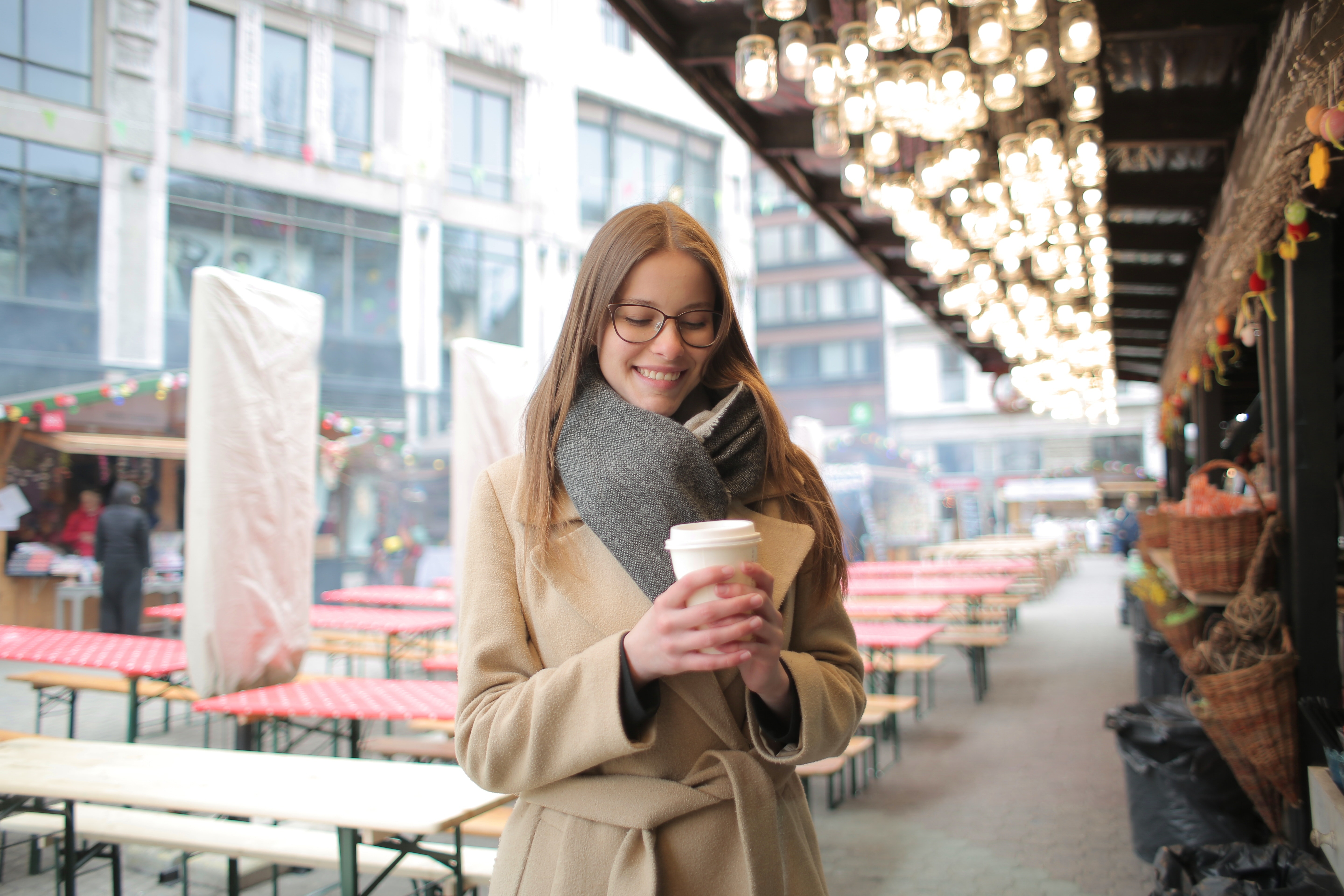 woman-in-brown-coat-holding-white-coffee-cup-3779924.jpg (1)